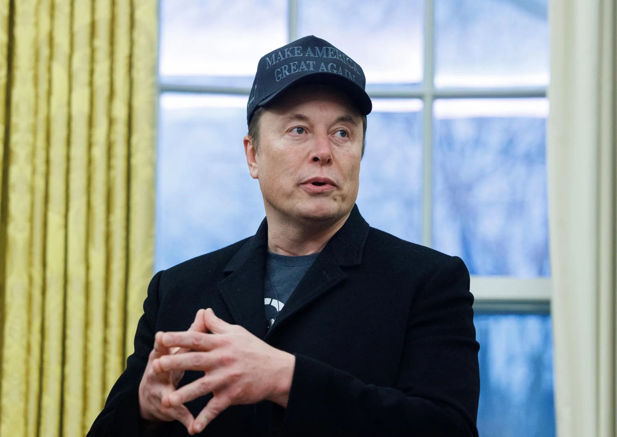 Will Elon Musk's net worth drop below $1 trillion and reach or exceed $1 trillion again by 31 December 2027?